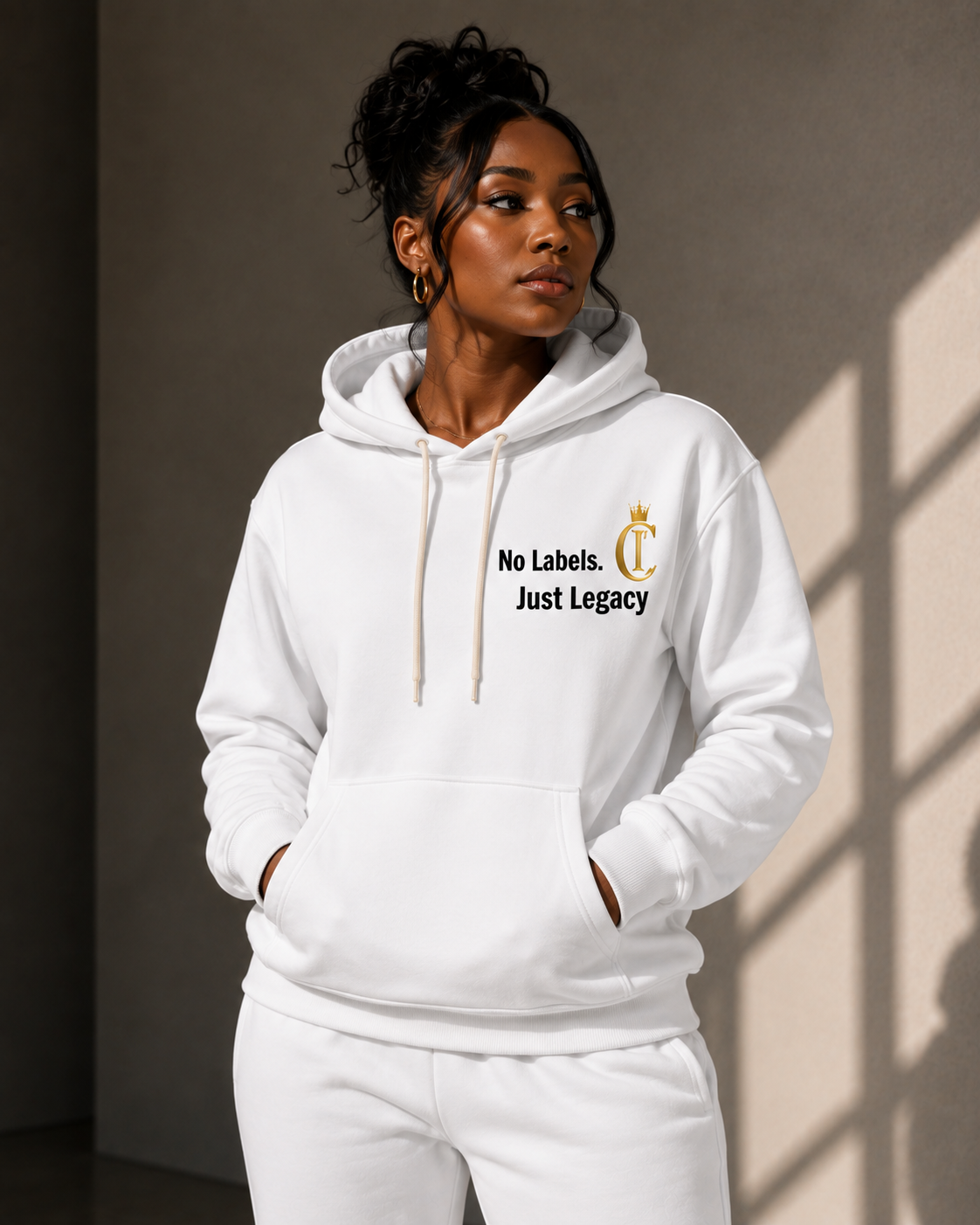 "No Labels. Just Legacy"The Chic Co. Gold Crown Monogram Hoodie